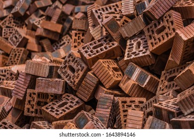 Pile Of Old Bricks Gathered On A Small Building Site After House Demolition