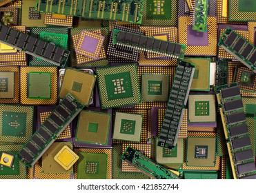 Pile Of Old CPU Chips, Obsolete Computer Processors And Memory Modules