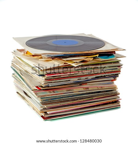 Pile of old dusty vinyl records isolated on white