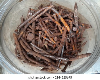 pile of old rusty iron nails