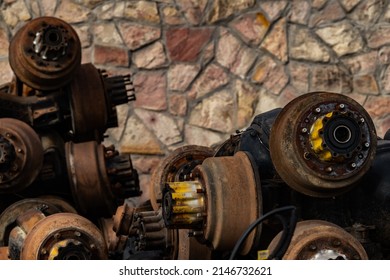 Pile Of Old Rusty Truck Axle At Second Hand Market Shop. Used Automotive Part For Sale. Old Rear Differential Of Truck. Truck Rear Axle. Heavy Duty Truck Rear Axle. Used Auto Spare Parts For Reuse. 