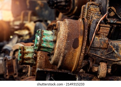 Pile Of Old Rusty Truck Axle At Second Hand Market Shop. Used Automotive Part For Sale. Old Rear Differential Of Truck. Truck Rear Axle. Heavy Duty Truck Rear Axle. Used Auto Spare Parts For Reuse. 