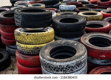 Pile Of Old Used Car And Bike Tyres Representing Hazardous Waste And Material For Recycling Rubber 