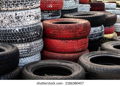 Pile Of Old Used Car And Bike Tyres Representing Hazardous Waste And Material For Recycling Rubber 