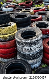 Pile Of Old Used Car And Bike Tyres Representing Hazardous Waste And Material For Recycling Rubber 