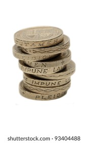 A Pile Of One Pound British Coins Stacked Showing The Royal Standard The Reverse Side Of The Coin