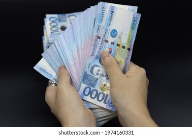 A pile of one thousand Philippines banknotes. Cash of Thousand dollar bills, Peso background image.
