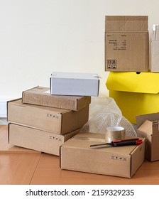 A Pile Of Packing Box On The Desk In The Dispatch Office. Copy Space.