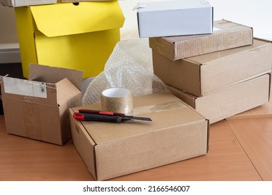 A Pile Of Packing Box On The Desk In The Dispatch Office. Copy Space.