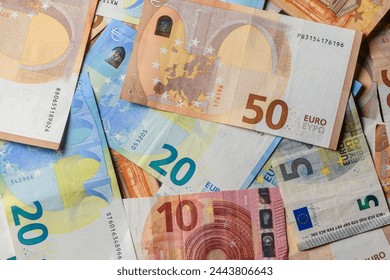 pile of paper euro banknotes as part of the united country's payment system 6 - Powered by Shutterstock