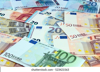 pile of paper euro banknotes as part of the united country's payment system