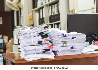 Pile Of Papers On The Desk