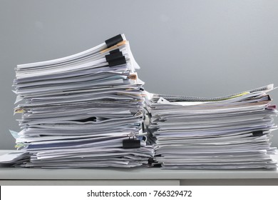 Pile Of Papers On The Desk