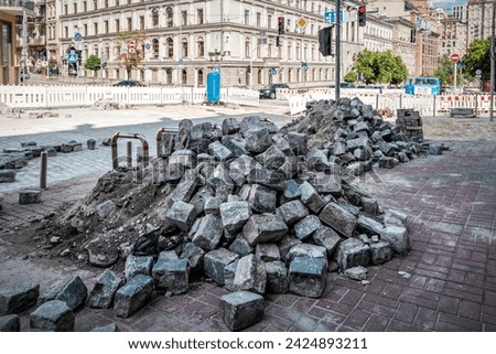 Pile of pavement stones on the street. Street renovation