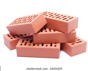 Pile Of Perforated Bricks Over White Background