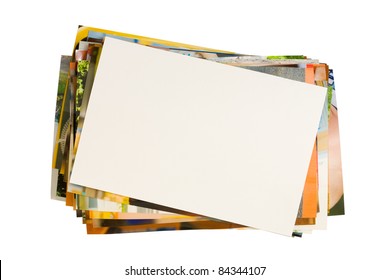 Pile of photographs with empty frame for your photo isolated on white background