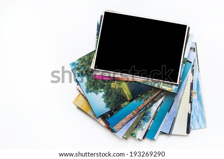 A pile of photographs with your empty space.