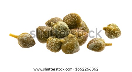 Pile of pickled capers isolated on white background with clipping path, macro