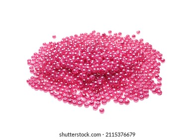 Pile Of Pink Beads On White Background