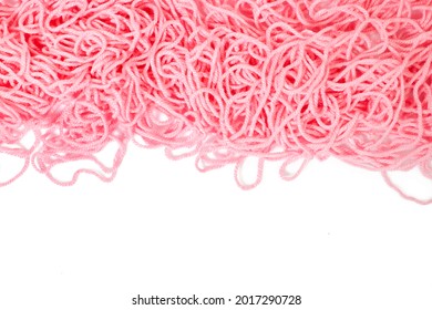 Pile Of A Pink Tangled Knitting Yarn Of Wool.