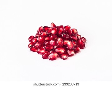 Pile Of Pomegranate Grains On A White Background