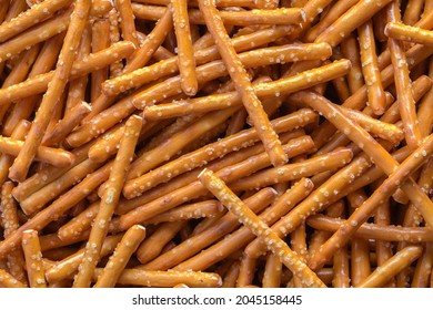 Pile Of Pretzel Sticks Background Texture Close Up.