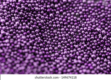 Pile purple balls of bead suitable for Background and texture