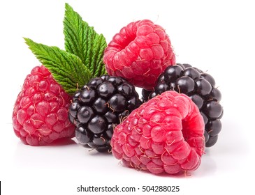 Pile Of Raspberries And Blackberries With Leaves Isolated On White Background