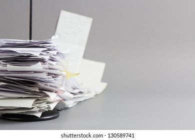 Pile Of Receipts In Paper Nail