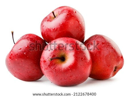 A pile of red apples close-up on a white background. Isolated