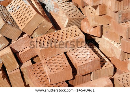 Pile of red cavity bricks