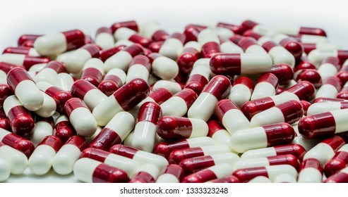 Pile Of Red And White Capsule Pills. Pharmaceutical Industry. Drug Inventory Management In Hospital. Health Budget. Drug Use In Daily Life. Global Healthcare. Pharmacy Drug Store Background. 