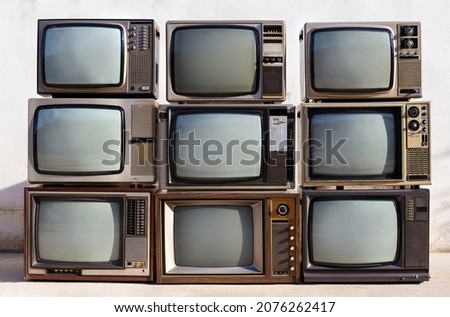 Pile retro old television (TV) background