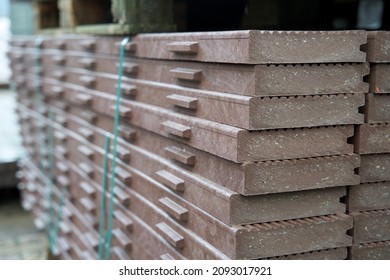 Pile Of Ribbed Planks Made From Recycled Plastic Waste