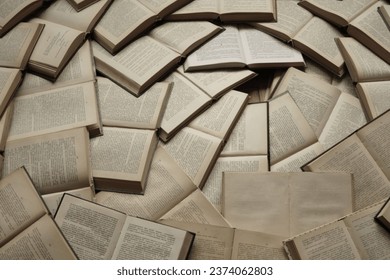 pile of round Books making pattern. text inside book. Book sheets close-up with text russian. Macro view shot between the pages of the book. Text english. circle open books around centre. top view.    - Powered by Shutterstock