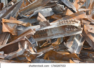 Pile Of Rusted And Bent Steel Beams