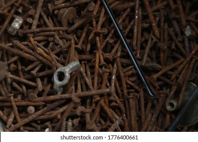 Pile of rusty concrete nails