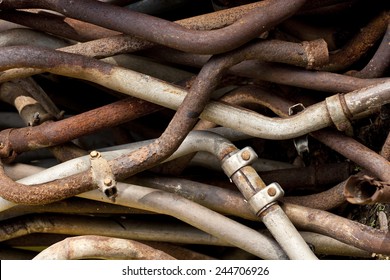 Pile Of Rusty Old Exhaust Pipes