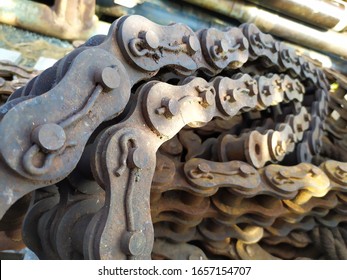 pile of rusty old machine chains.
the image is out of focus because it is using a smartphone camera