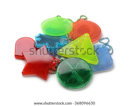 Pile of safety reflectors isolated on white