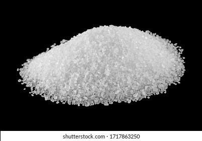 Pile of salt on a black background. Sea salt.