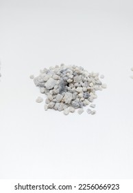 Pile of Sand quartz or gravel silica sand isolated on white background. Quartz sand known as sand filter is used in finishing construction materials, water filter treatment and agriculture