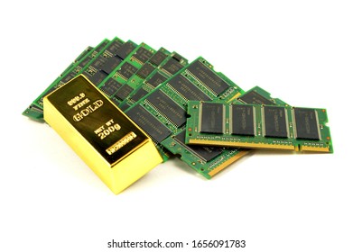 A Pile Of Scrap Computer RAM Chips With A Pure Gold Bullion Bar To Show That The Precious Metal Can Be Recovered From Electronic Waste.