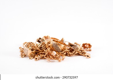 A Pile Of Scrap Gold Isolated On White