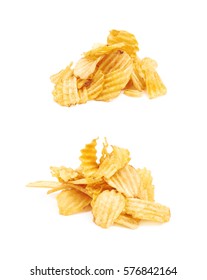 Pile of seasoned potato chip crisps isolated over the white background, set of two different foreshortenings - Shutterstock ID 576842164