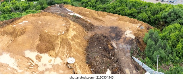 Pile Of Soil Excavated From The Pit During The Construction Of Structures - Clay Storage, The Ravine Is Covered With Excavated Soil And Leveling The Terrain For New Construction, Selective Focus