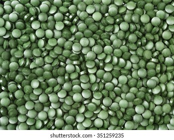 Pile Of Spirulina Tablets Background