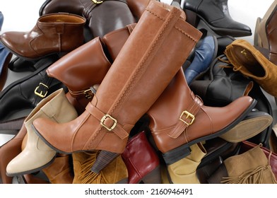 Pile ,stacked Of Different Female Leather Boots 