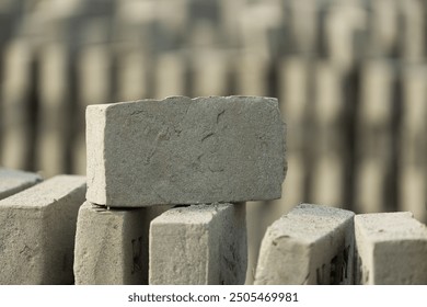 Pile, stacks pattern of mud bricks or clay bricks before burning for building clay house.