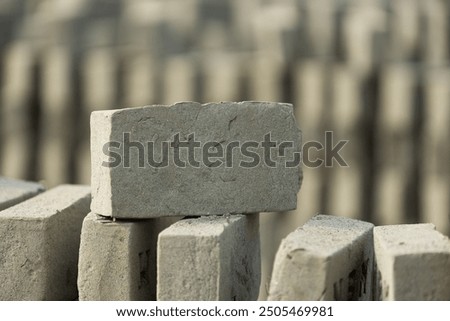 Pile, stacks pattern of mud bricks or clay bricks before burning for building clay house.